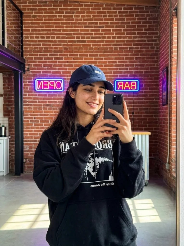 Aesthetic mirror prompt preview with industrial loft, exposed brick, neon signs, baggy hoodie, and baseball cap