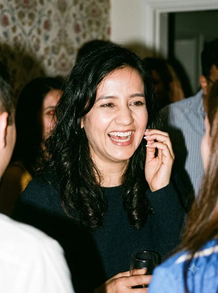1990s candid portrait of a laughing woman at a casual gathering