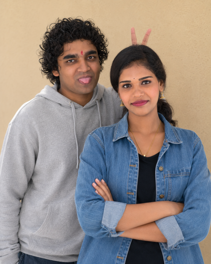Teenage brother and sister posing for a playful teasing portrait