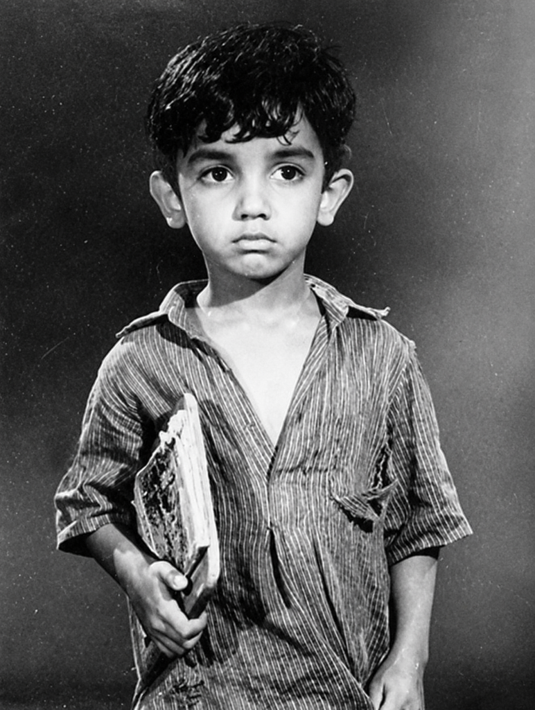 Enhanced blurry childhood photograph with improved clarity and preserved facial detail