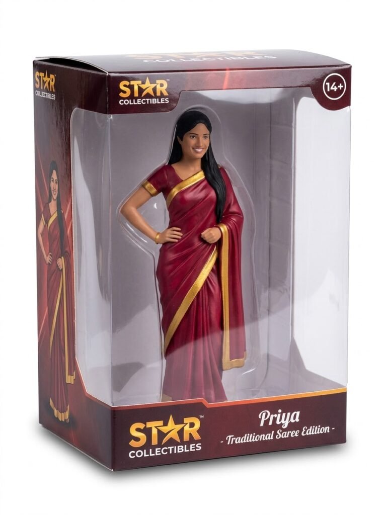 Boxed figurine of a woman in a red saree inside clear window packaging