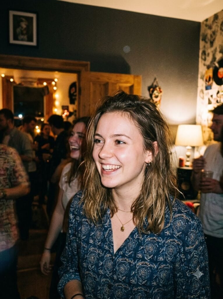 Retro portrait with direct disposable-camera flash, grainy texture and candid framing