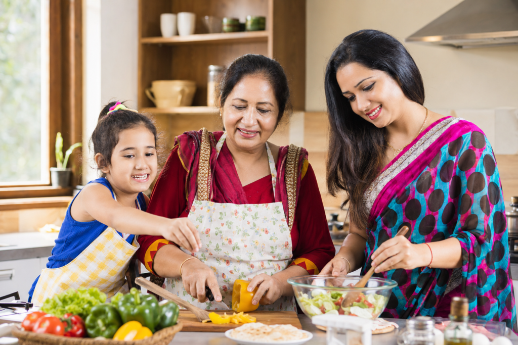 Grandmother, mother and young daughter together in a warm three-generation portrait