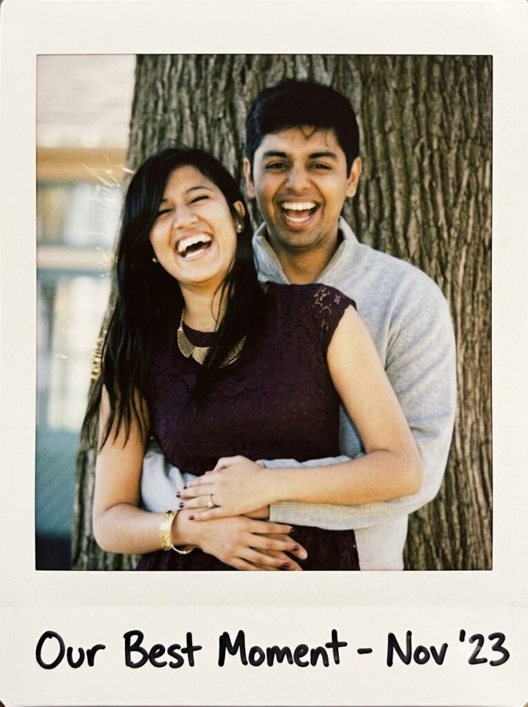 Couple laughing together in a candid Polaroid-style photo