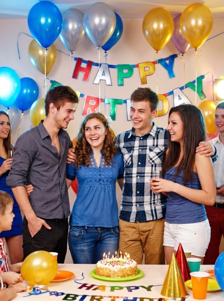 Friends celebrating at a decorated birthday party with balloons
