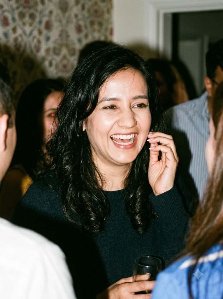 1990s candid portrait of a laughing woman at a casual gathering